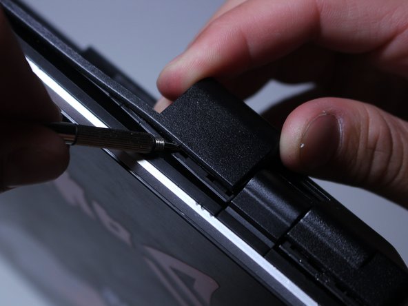 Work your way around the back corners of the computer as well.