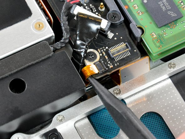 Image 2/2: Pull the IR/sleep LED ribbon cable straight out of its socket.