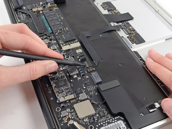 Image 1/2: Be sure you are prying up on the hinged retaining flap, '''not''' the socket itself.