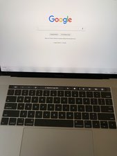 Shadows at the bottom of the screen - MacBook Pro 15" Touch Bar 2017
