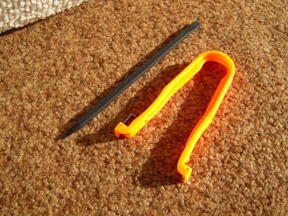 Image 3/3: You will need a spudger to remove the keys. An IC mounting tool can be helpful in replacing them.