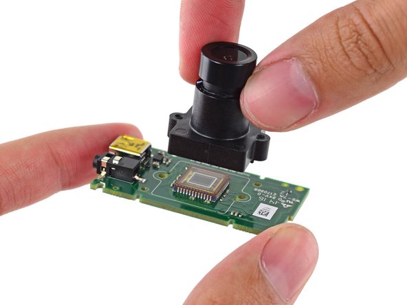 Image 2/3: After playing around with the positional camera lens, we conclude that it's a wide angle lens. This allows the positional camera to see more IR LEDs at once, expanding its tracking abilities.