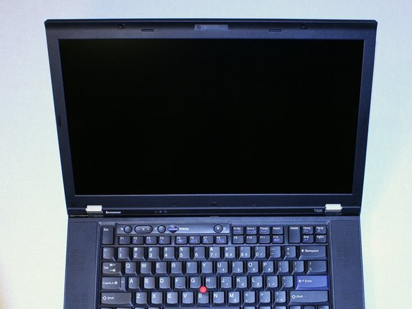 Image 3/3: If everything looks ok then remove the battery and put the screws in. Remove the protective sheet from the display and put the bezel back on.