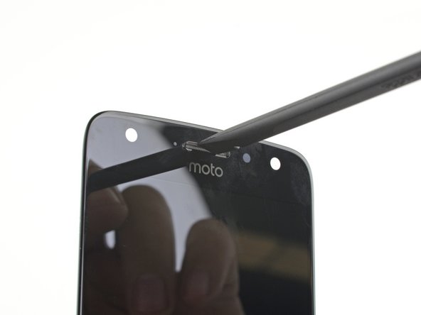 If your replacement screen did not come with an earpiece speaker grille, you will have to transfer it from your original screen.