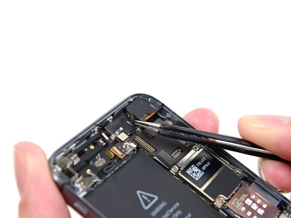 Image 1/2: '''Do not''' attempt to fully remove this cover, it is attached to the rear case, and only needs to be flipped open, not removed.