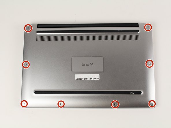 Remove the eight 4 mm T5 Torx screws from the bottom cover.