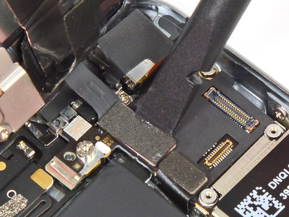 Image 3/3: When reassembling your phone, the LCD cable may pop off its connector. A blank screen, or white lines on the display could be caused by a loose connection. Should this happen, reconnect the cable and power cycle your phone. The best way to power cycle your phone is to disconnect and reconnect the battery.