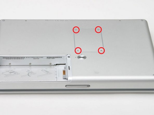 Image 1/1: Slide the memory door away from the memory compartment.
