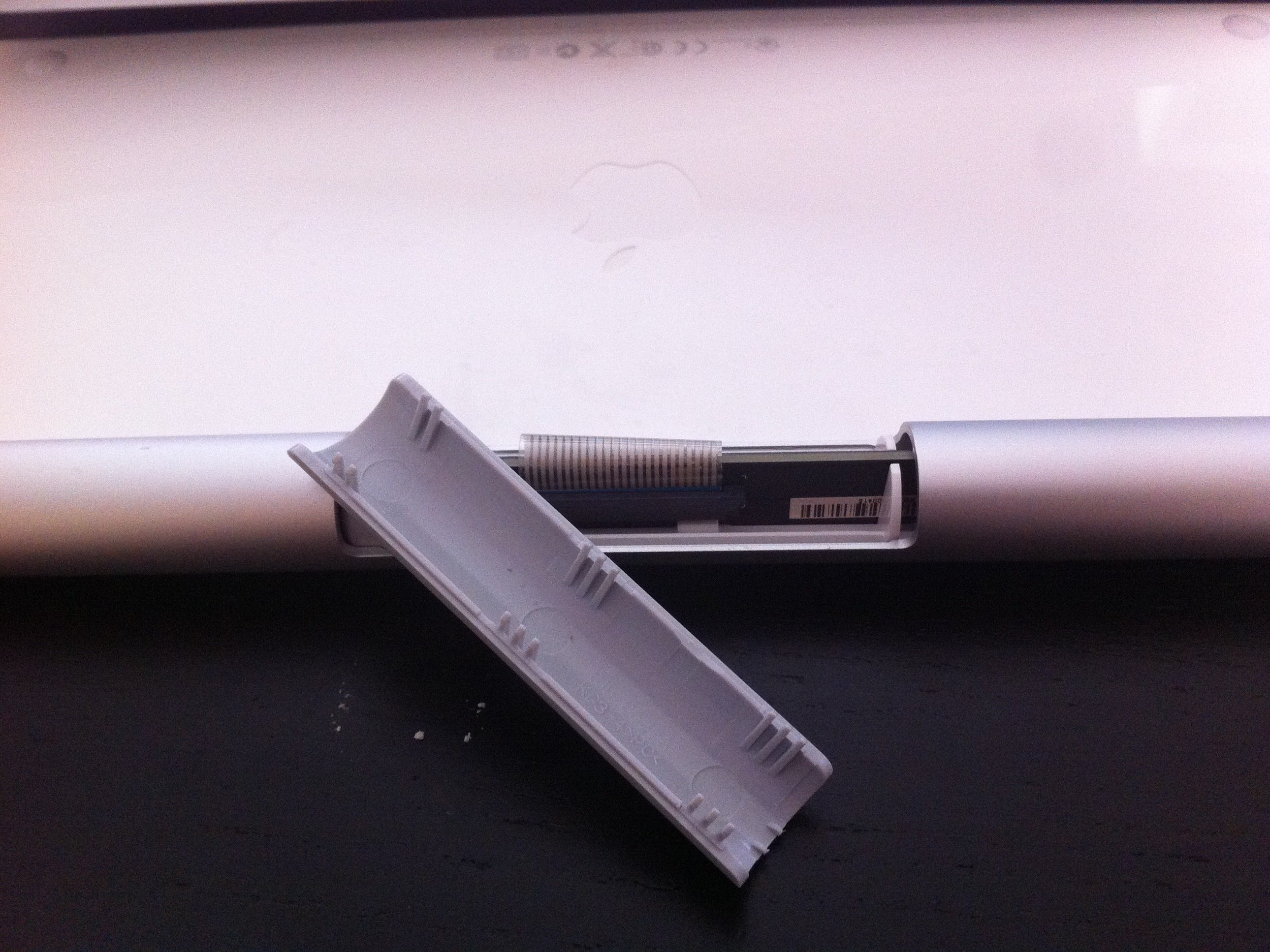 Disassembling the Board, Power Button, and Battery Compartment of an