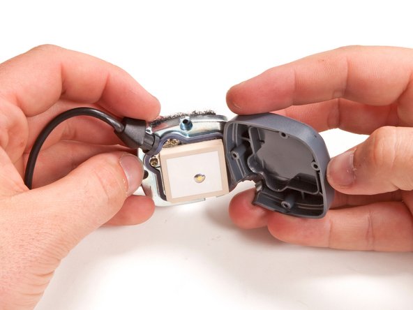 Image 2/3: In keeping with the non-permanent mounting solutions, the GPS antenna is attached to its bracket with a hefty piece of Velcro.