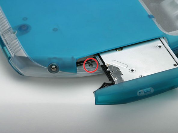 Image 1/1: Remove the silver Phillips screw from the plastic casing.