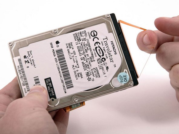 Image 1/1: This is a bit tricky. Try rocking the cable gently from side to side while applying even pressure. If you bend the pins, do your best to straighten them, using the hard drive cable as a guide.