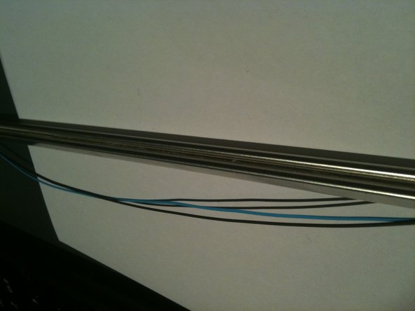 Image 2/3: Note the thin wires are held in the groove by a small amount of adhesive.