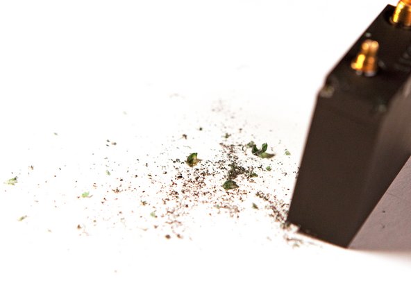 Image 3/3: The FBI really did not want anyone tampering with the innards of their tracking devices. The screws were coated with so much threadlocker that we had to break out the power drill and eliminate the screw heads.