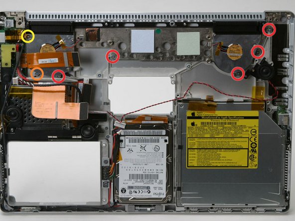 Image 1/1: Remove the following 7 Phillips screws attaching the heat sink to the metal framework: