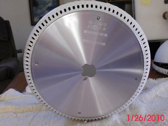 Image 2/3: The bottom of the plate will list the serial number, MHz of the machine, standard RAM and hard drive size