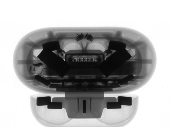 At the other end, recessed deep within each AirPod housing, is a pair of contacts for charging the 'Pods respective onboard batteries.