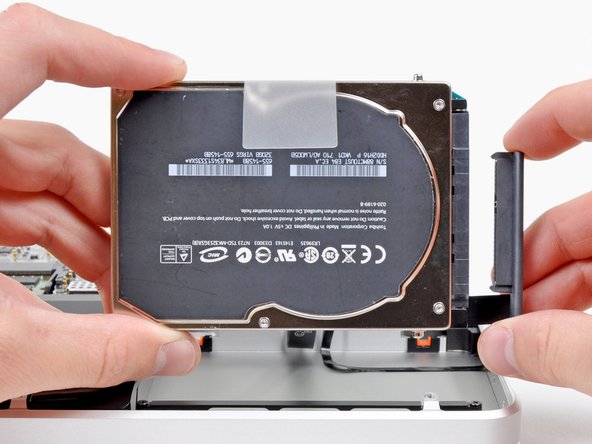 Image 2/2: Remove the hard drive from your MacBook Pro.