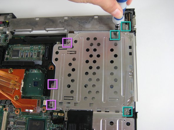 Image 1/1: Remove three other screws on the other side of the covers.