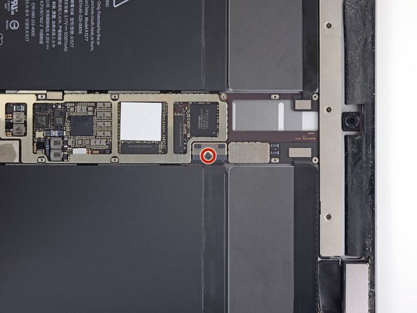 Remove the 1.8 mm Phillips screw securing the battery connector.
