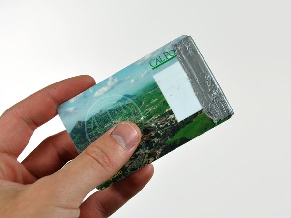 Image 3/3: Pull the front bezel away from the rear case.