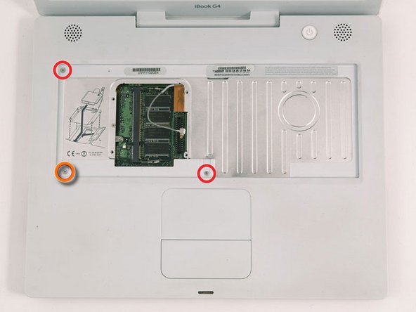 Image 1/1: Turn over the computer and open it.