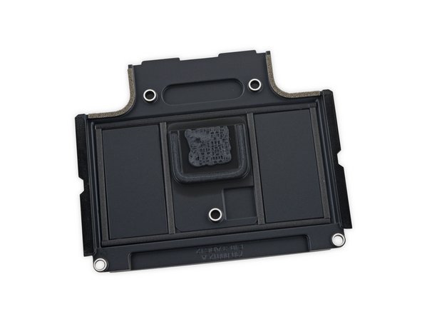 Image 3/3: By the looks of it, this plate also serves as a bracket, giving the clips on the lower case something to latch onto. That's three functions in one component, folks.