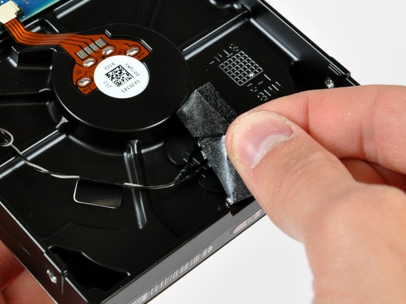 Peel off the piece of foam tape covering the hard drive thermal sensor.