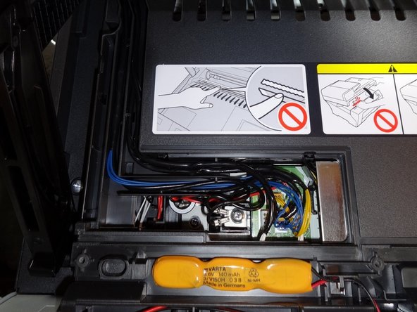 Remove the Panel on the left side exposing the wiring connectors for the top of the printer