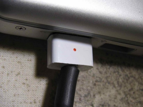 Image 1/1: Squeeze in place with the pliers. If it doesn't fit over the circuit board fairly easily, check that you don't need to file down the solder joints some more.