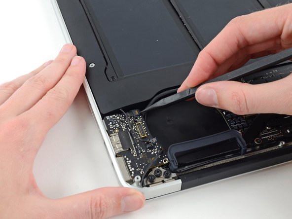 Image 1/2: Make sure you are flipping up the retaining flap, '''not''' the socket itself.