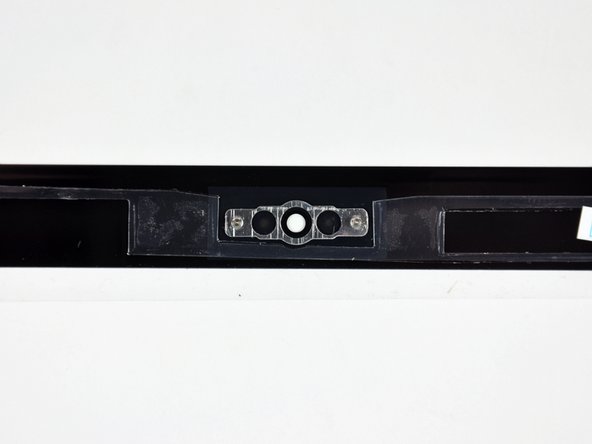 Image 2/2: Do not forget to stick the camera bracket down to the new front display glass before reassembly.