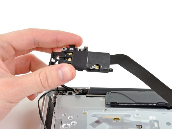 Image 2/2: Remove the AirPort/Bluetooth board assembly.