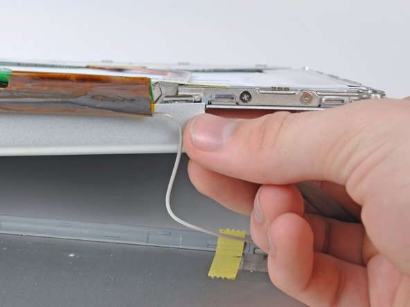 Image 1/2: Remove the clutch cover from the device.