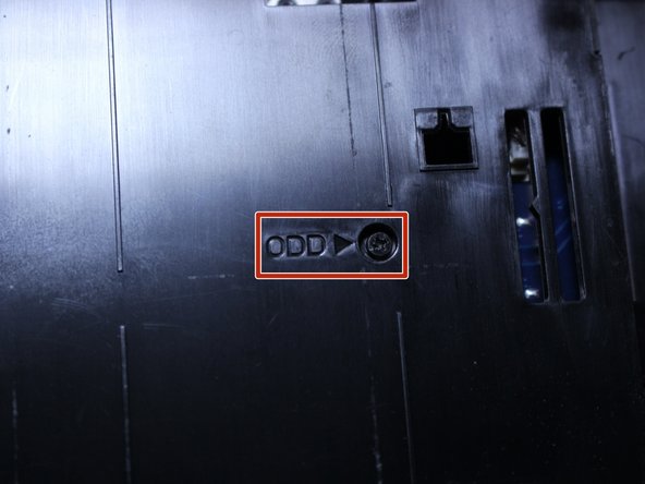 Locate the screw next to the &quot;ODD&quot; print as indicated in the photo.