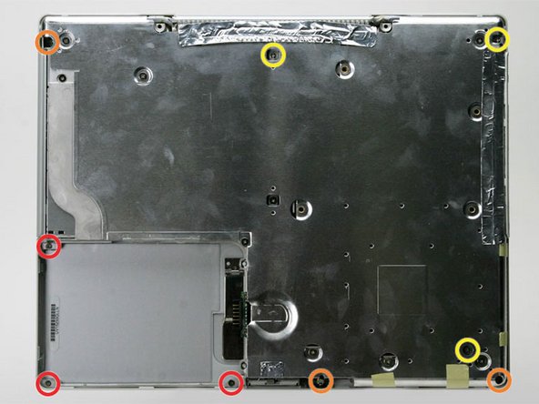 Image 1/1: Remove the following 9 screws on the bottom of the computer: