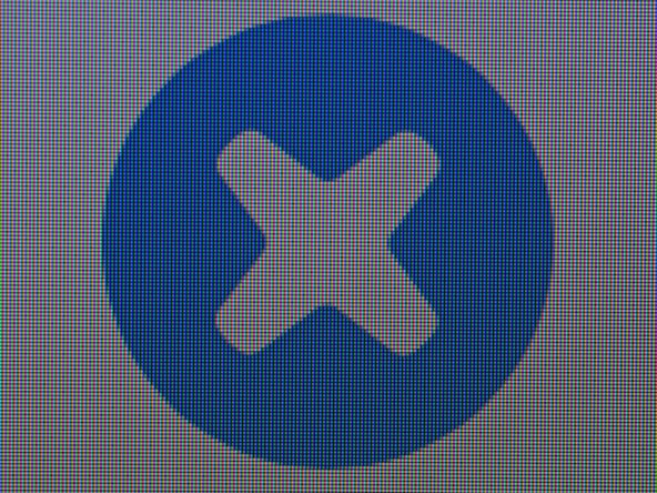 Image 1/3: This new display (first image) packs quite a punch, especially compared to the non-Retina iMac (second image). The difference is like pixelated night and seamless day.