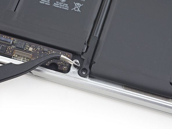 Image 2/2: The previous gen's adhesive seemed plenty strong—so, is Apple poofing away these screws because they weren't ever needed, or because they aren't needed ''now''? Perhaps a  ''stronger'' adhesive made these screws unnecessary? We shudder at the thought.