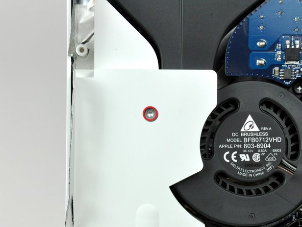 Image 1/2: Pull the left speaker out of the rear case.