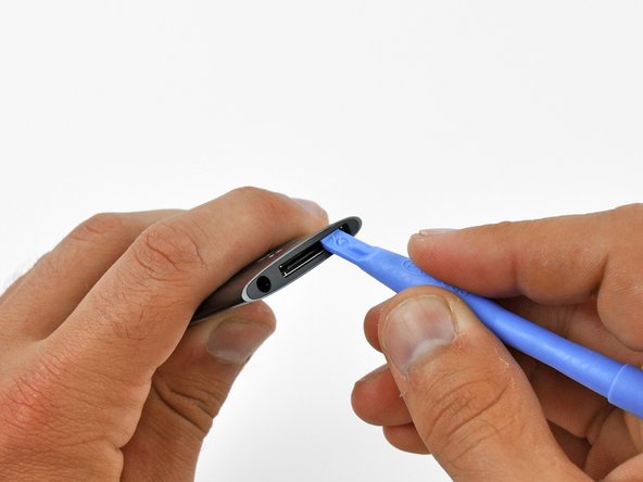 Image 1/2: Use a low heat setting and do not hold the heat gun in place for too long to avoid melting the plastic bezel.