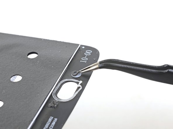 If your replacement part did not come with a lower microphone gasket, use tweezers to carefully peel it from your old screen and transfer it to your replacement part.