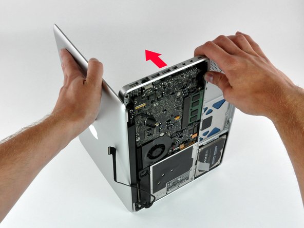 Image 1/3: Rotate the display slightly away from the upper case.