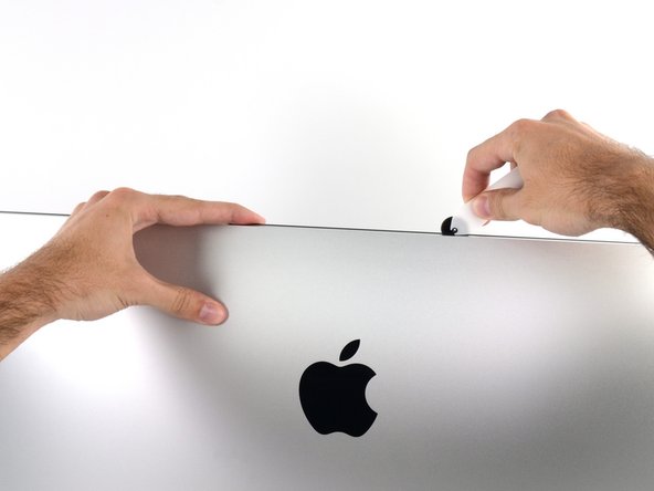 Image 1/2: You may want to run the tool back and forth through what you've already cut a few times, to ensure you get as much of the adhesive separated as possible.