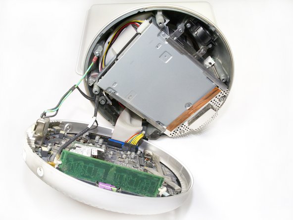 Image 2/2: Open slowly to ensure that no cables are damaged or disconnected.