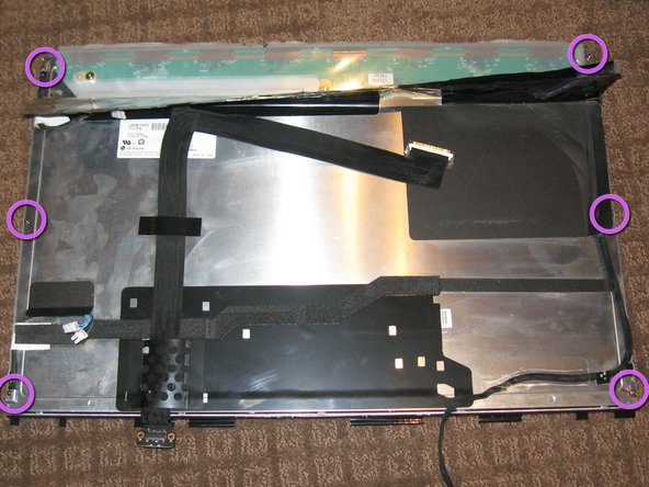 Image 1/3: Remove the 6 Philips screws from the rear of the back light assembly