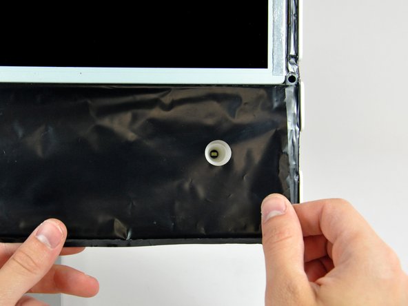 Image 1/1: It is not necessary to peel the lower EMI shield off the display.