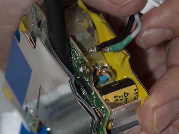 Image 3/3: Separate the cables. It may require some force, so be careful not to break the board.