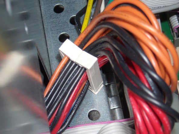 Image 2/3: There is a clip holding the wires in place. Separate and remove the wires. (both sets)