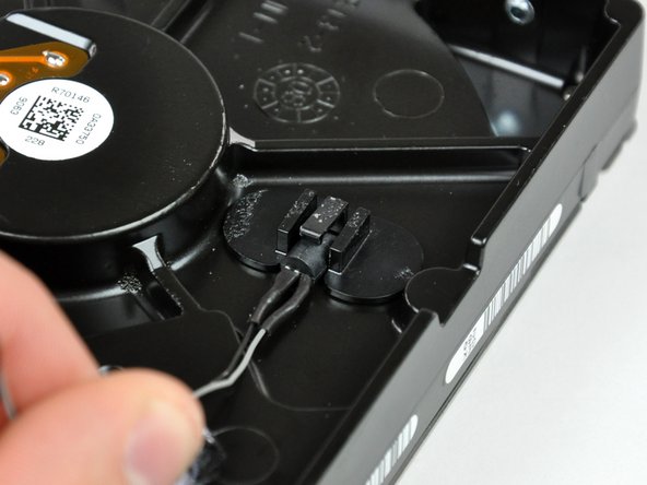 Image 2/2: If your thermal sensor seems to be stuck to the face of the hard drive, skip to the next step.