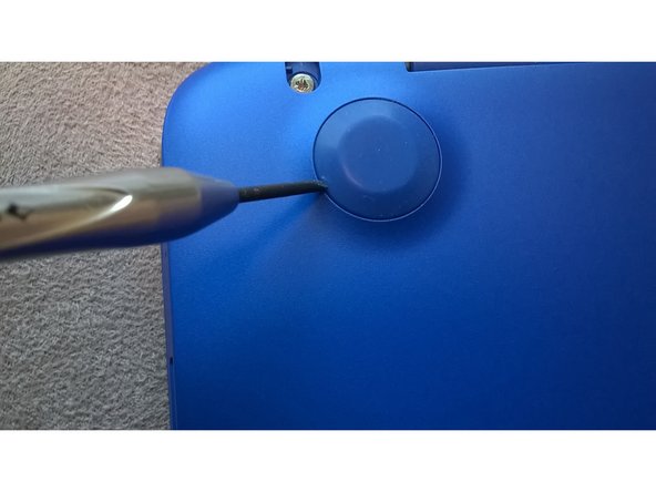 Beneath each pad is a screw. Make sure you remove all of the pads.